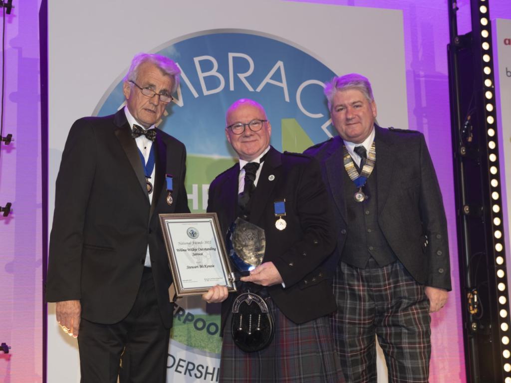 Former HCA chair Stewart McKenzie receiving the Wilma Wilkie Outstanding Service Award in 2022
